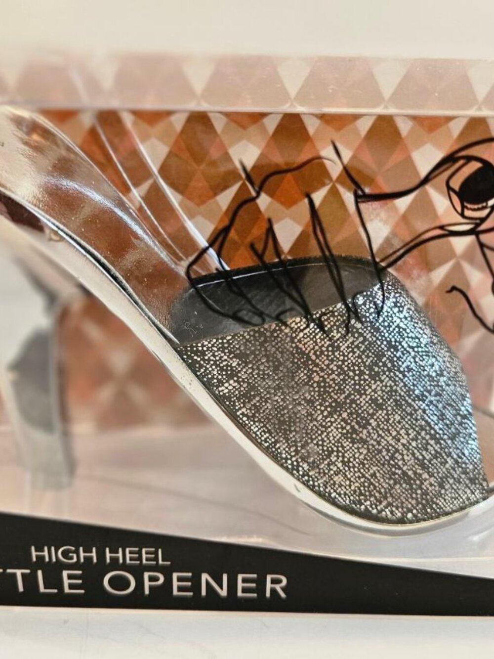 Wild Eye Designs high heel shoe-shaped bottle opener, metallic black.